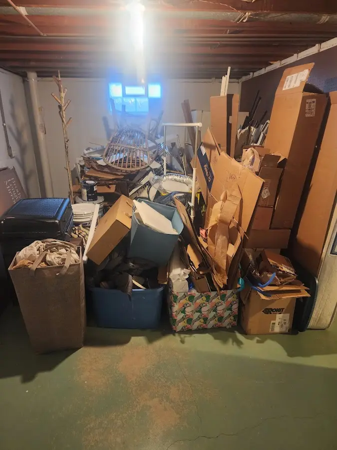 Roll-off dumpster container at job site for Cleanout Dumpster Rental in Stratham